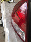 2004 - 2007 FORD TAURUS Tail Light Assembly Quarter Panel Mounted Driver Side LH