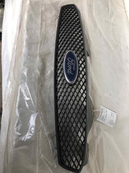2004 - 2007 FORD TAURUS Front Bumper Grille Mesh w/ Emblem OEM
